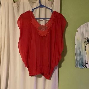 Cute summer top. It’s has sleeves and  they are unique